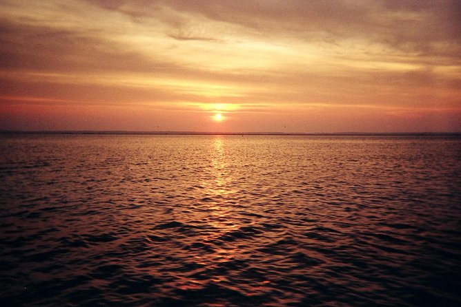 Champagne Sunset Sail in St. Lucia - Sunset, clouds, and the possible green flash