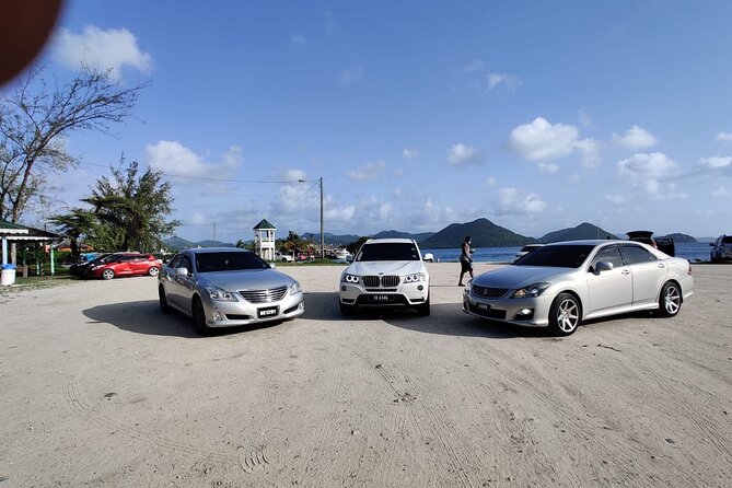First Class Private Airport & Hotel Transfers - Water, snacks, Piton beer, and special-occasion touches