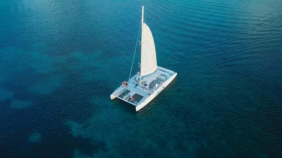 From Castries: Full-Day Catamaran Tour to Soufriere - Sailing south toward Soufrière and the Pitons