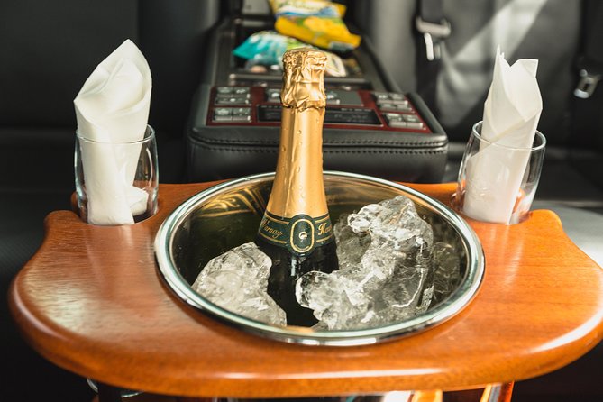 Private Luxury Transfer - Round Trip (Hewanorra International Airport UVF) - Champagne, Piton beer, and a cool towel