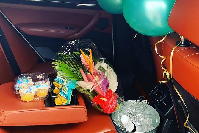Private Round Trip Airport (UVF) Transfer: Luxury SUV - Drinks, snacks, and the champagne question