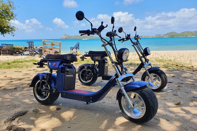 St.Lucia Beaches and Backroads Tour by Electric Big-Wheel Scooter - Darren Sammy National Cricket Stadium adds local context
