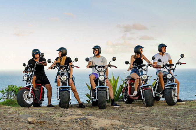 St.Lucia Beaches and Backroads Tour by Electric Big-Wheel Scooter - Gros Islet brings fishing boats and an old chapel