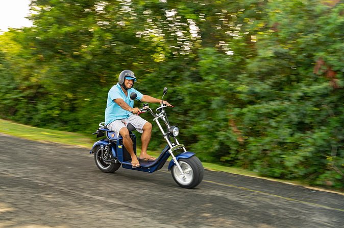 St.Lucia Beaches and Backroads Tour by Electric Big-Wheel Scooter - Cap Estate shows the island’s polished side