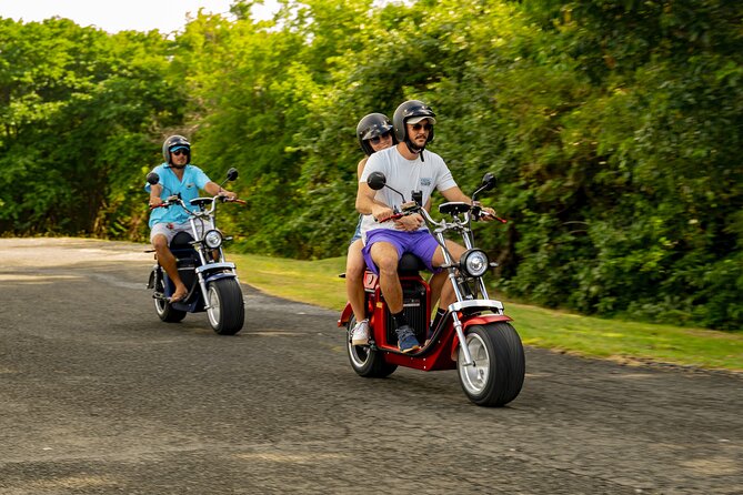 St.Lucia Beaches and Backroads Tour by Electric Big-Wheel Scooter - Reduit Beach starts the ride beside the sand