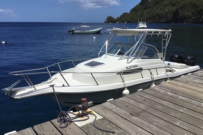 St. Lucia Private Boat Tour, Mud Bath, Waterfall & Beach Time - The coast, the Pitons, and film locations by boat