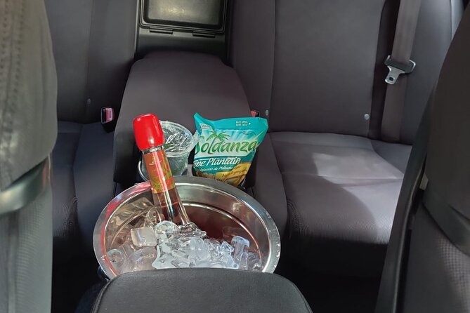St Lucia Private Roundtrip Transfer: Hewanorra International Airport - Snacks, water, and Piton beer