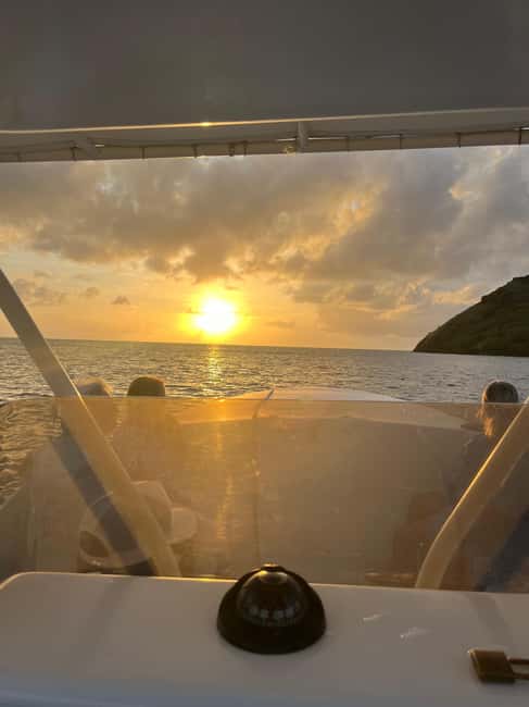 St. Lucia: Sunset Cruise, best way to end a day in paradise - Watching the sun from the boat’s deck