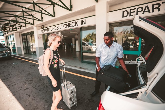 St. Lucia West Coast Airport Transfer - See The Pitons - Meeting your driver at UVF airport